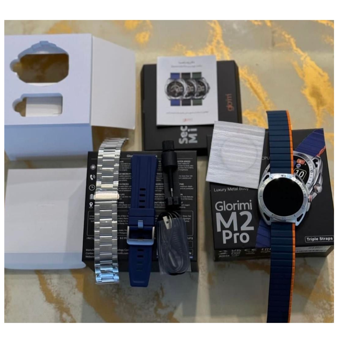 ساعت هوشمند گلوریمی مدل MOB M2  PURE BASS OPR دارای قابلیت های کنترل موسیقی، شمارنده ضربان قلب، گام شمار، قابلیت مکالمه از طریق بلوتوث، پشتیبانی از زبان فارسی، بند سیلیکون