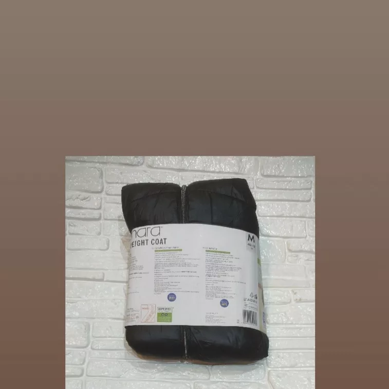 کاپشن زنانه اسمارا، از جنس پلیاستر و پلیآمید با طرح ساده و تنخوری معمولی، مدل ES3780