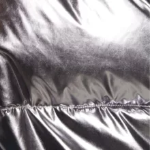 کاپشن زنانه بیک بوک، از جنس پلی‌استر با طرح ساده و تنخوری معمولی، مدل MLNZ01