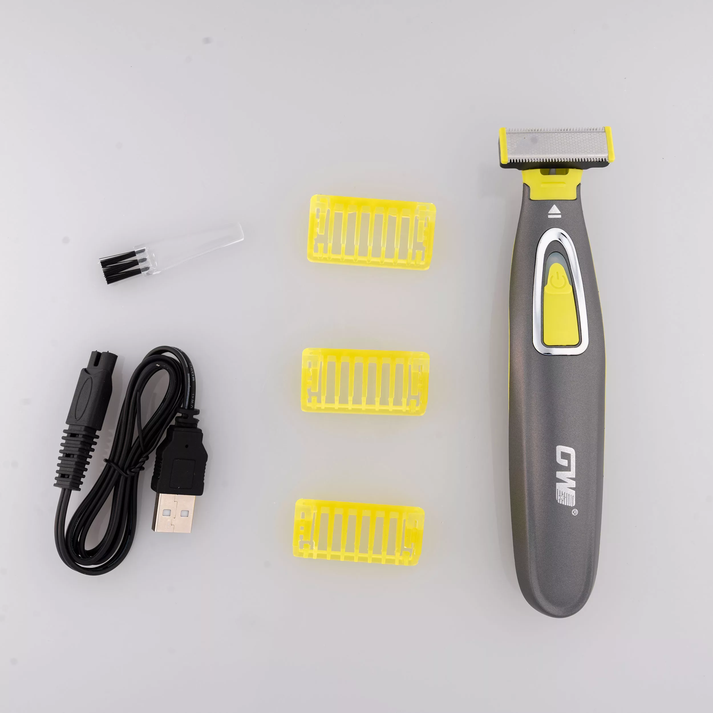 ماشین اصلاح موی صورت شارژی جی دبلیو مدل GW-9866، اصلاح به صورت صفر زن، طراحی ارگونومیک، منبع انرژی با باتری، تکنولوژی اصلاح به صورت تریمر، اندازه اصلاح 0.1 میلیمتر، مدت زمان شارژ 480 دقیقه، دارای بدنه ضد لغزش، به همراه برس تمیزکننده و کابل شارژ USB