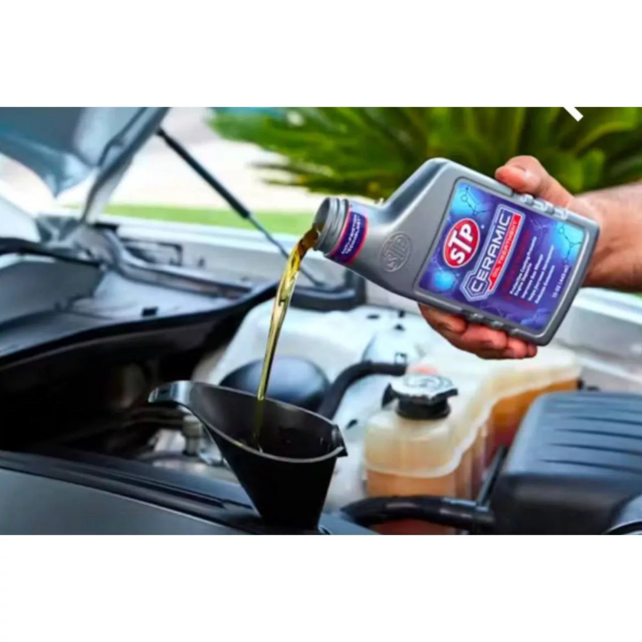 مکمل روغن موتور خودرو بنزینی اس تی پی مدل 68443EN حجم 443 میلی لیتر