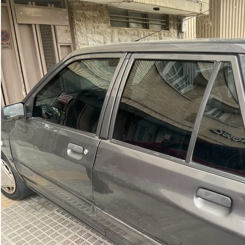 برچسب دودی شیشه خودرو هایلوکس کد Ddi15 مناسب برای پژو پارس مجموعه 7 عددی به همراه جاکلیدی