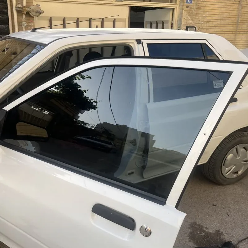 برچسب دودی شیشه خودرو هایلوکس کد Ddi15 مناسب برای پژو 405 مجموعه 7 عددی به همراه جاکلیدی