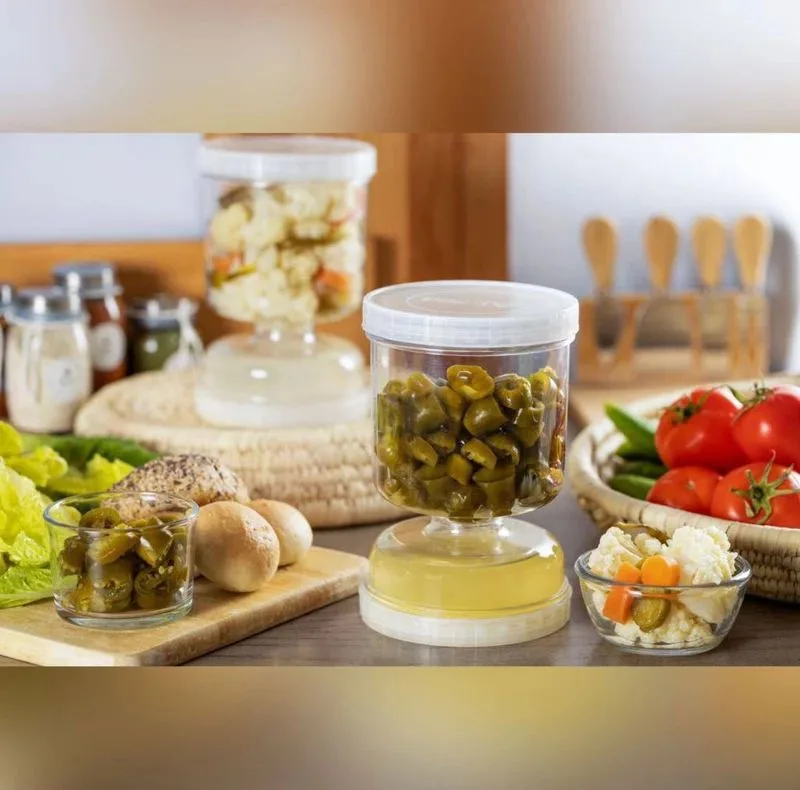 بانکه مدل ظرف خیار شور طرح ساعت شنی