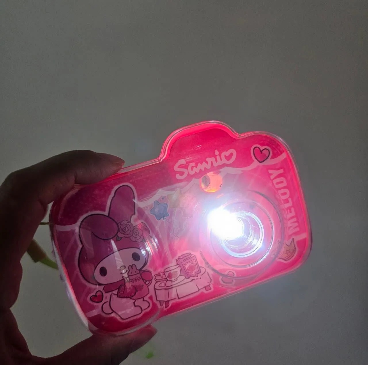 اسباب بازی ناب سل مدل دوربین پروژکتوری ملودی چراغدار به همراه 15 طرح کارتونی کد MELODY PROJECTOR CAMERA NAAB003