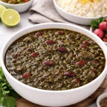 کنسرو قورمه سبزی بدون گوشت بهین - 450 گرم بسته 12 عددی