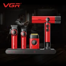 ست ماشین اصلاح مو، صورت و سشوار وی جی ار مدل Stepless Pro مجموعه 4 عددی با قابلیت تنظیم سرعت بی‌پله، نمایشگر دیجیتال، تیغه‌های ضد التهاب و شارژ سریع، بدنه فلزی مقاوم و طراحی ارگونومیک همراه شانه و استند شارژ
