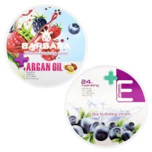 کرم مرطوب کننده باربارا مدل آرگان حجم 250 میلی لیتر به همراه کرم آبرسان باربارا مدل بلوبری حجم 250 میلی لیتر