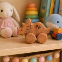 اسباب بازی چوبی مدل دایناسور چرخ‌دار مجموعه 3 عددی