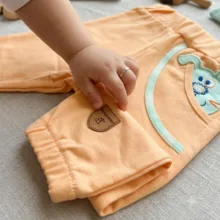 شلوار نوزادی به آوران طرح پاپی