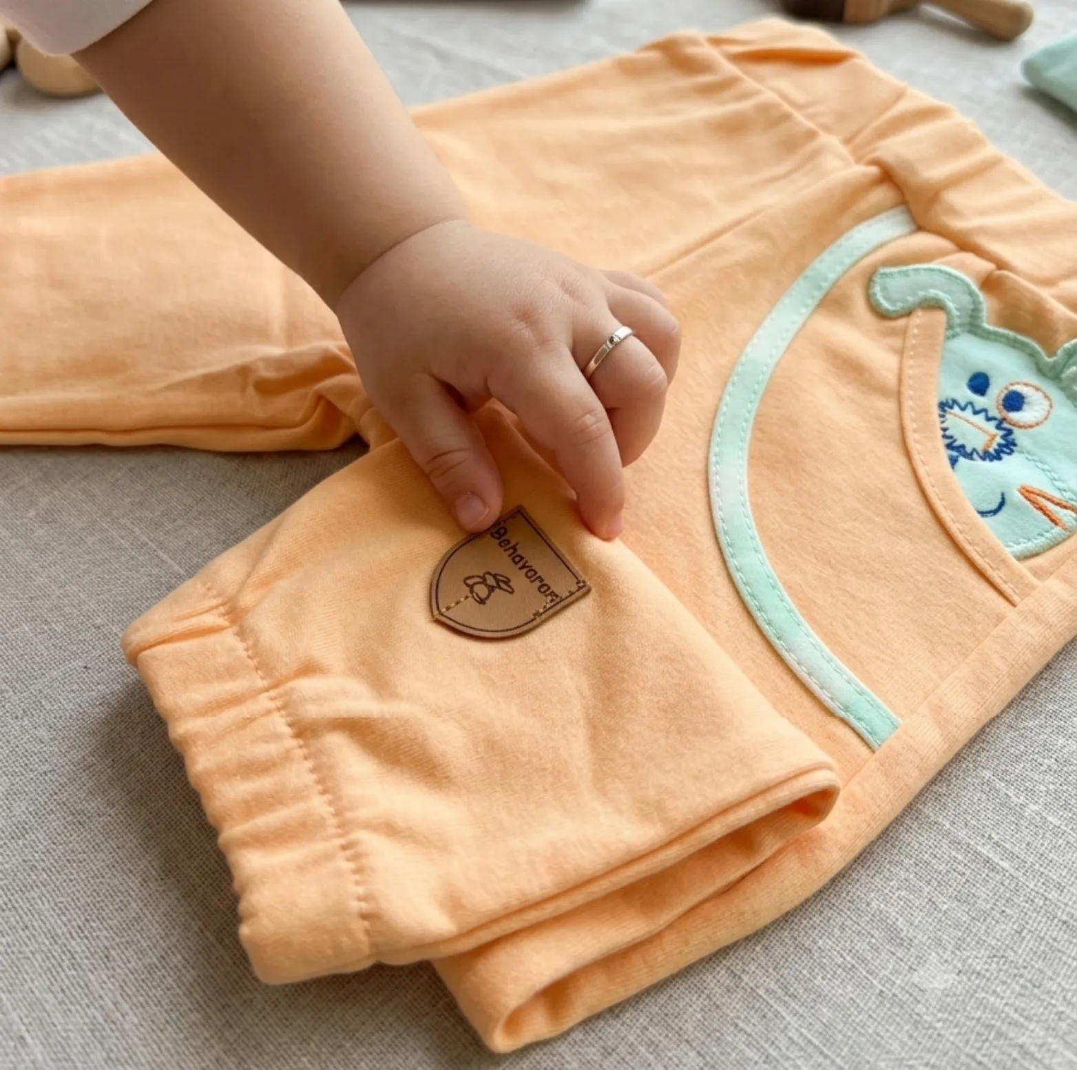 شلوار نوزادی به آوران طرح پاپی