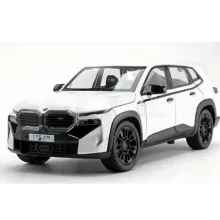 ماشین بازی شاسی‌بلند غیرکنترلی مدل BMW XM با بدنه فلزی، درهای بازشو از بغل، آینه متحرک، چرخ‌های پلاستیکی و منبع انرژی باتری سکه‌ای