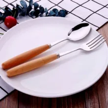 سرویس قاشق و چنگال 12 پارچه مدل دسته چوبی