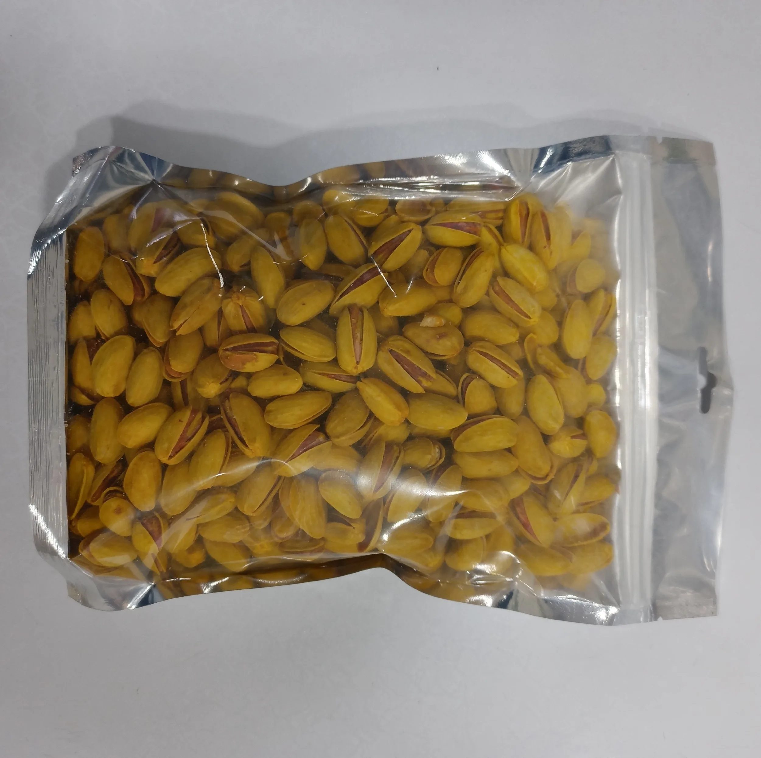 پسته اکبری طعم زعفرانی - 250 گرم