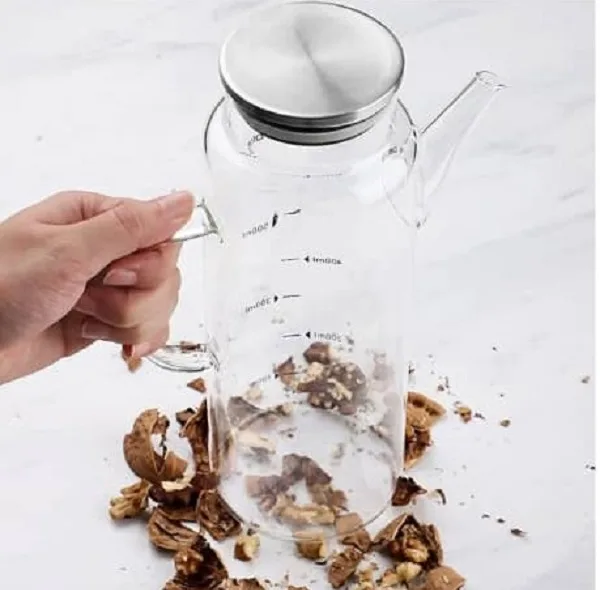 ظرف روغن مدل درب استیل واشردار ظرفیت 1000میلی لیتر