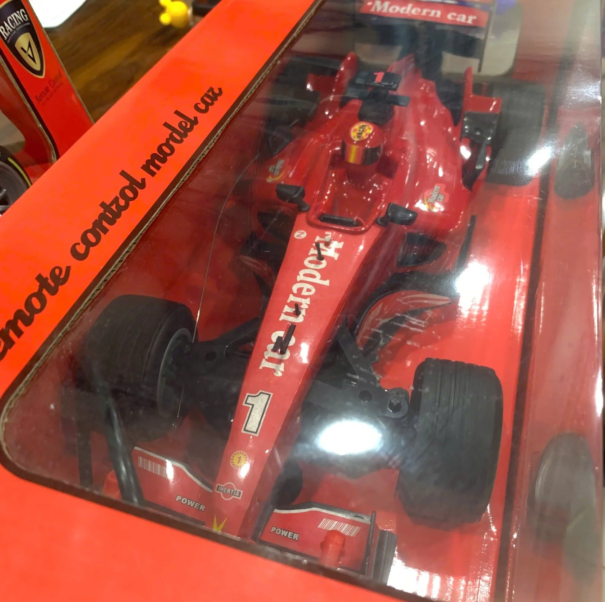 ماشین کنترلی فرمول یک مدل Racing Formula Car با باتری شارژی، چرخهای لاستیکی و ابعاد 420 × 150 × 100 میلیمتر