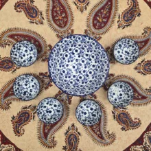 ست 7 پارچه آجیل‌خوری و انارخوری چینی دنی هوم مدل انارخوری، مناسب شستشو با دست و ماشین ظرفشویی، کاسه بزرگ با قطر 20 سانتی‌متر و ارتفاع 10 سانتی‌متر، کاسه‌های کوچک با قطر 8 سانتی‌متر و ارتفاع 5 سانتی‌متر