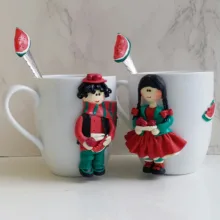 ماگ سرامیکی مدل شب یلدا کد L650 به همراه قاشق مجموعه 2 عددی