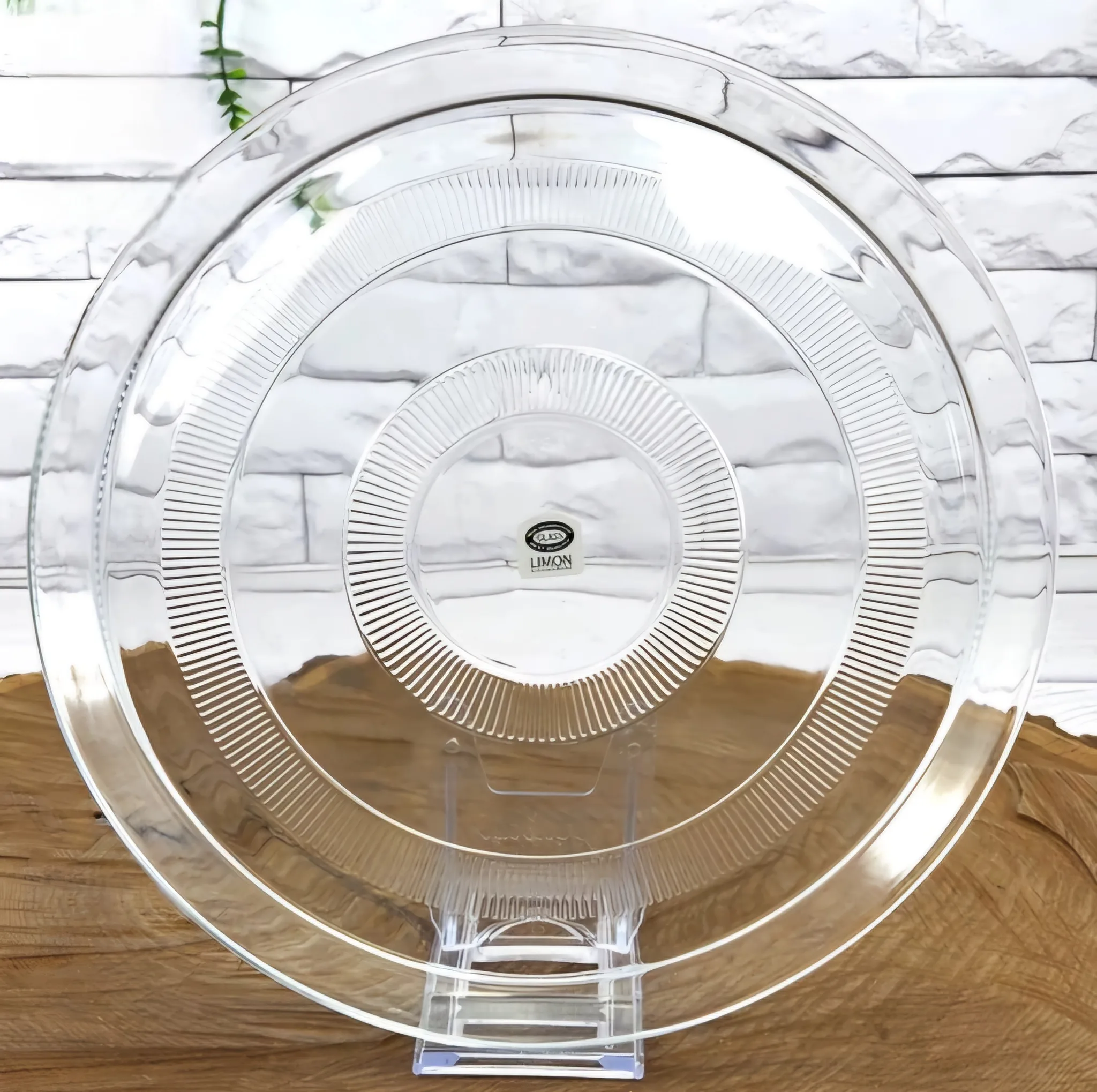 دیس شیشهای لیمون مدل گرد کد HS2437، ابعاد 30×30×2.5 سانتیمتر، ضدشوک حرارتی، مناسب پیتزا، برنج و کیک