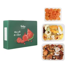آجیل مخلوط شب یلدا اکبر راستگو - 700 گرم به همراه میوه خشک اکبر راستگو - 250 گرم و زردآلو خشک اکبر راستگو - 500 گرم