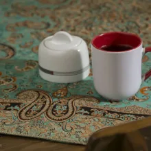 ترمه سپهر یاس رومیزی مدل بته جقه طلایی یشمی طرح7 یک تکه سایز 100*100 سانتیمتر