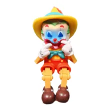 فیگور مدل پینوکیو نشسته ارتفاع ۱۵ سانتی متر